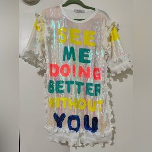 Party dress “see me doing better than you”